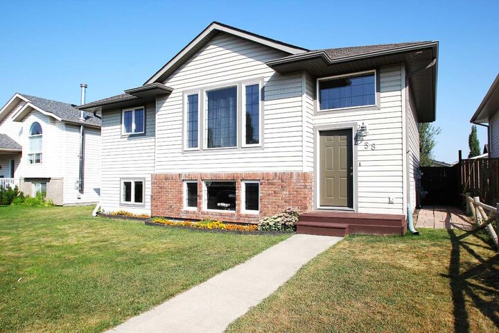 Property Photo: 58 Kirkland Close AB T4P 4A3