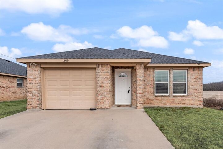 Property Photo:  309 E 2nd Street  TX 76064 