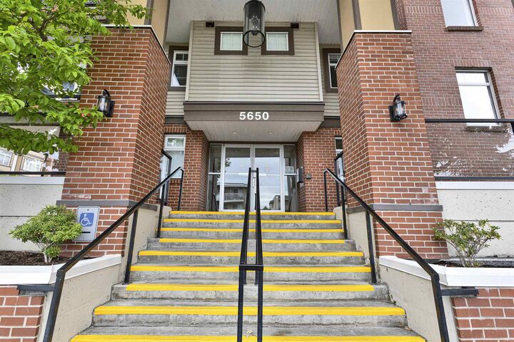Property Photo: 5650 201A Street 117 BC V3A 0B3
