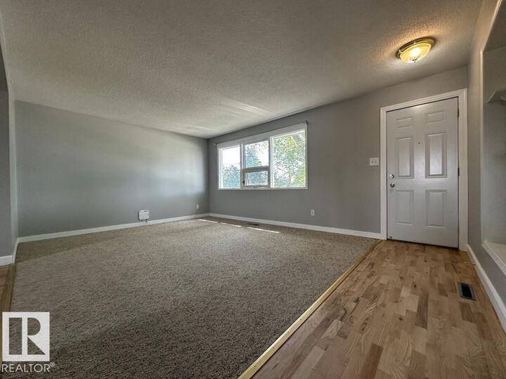 Property Photo:  9512/9514 128 Avenue NW  AB T5E 0H6 