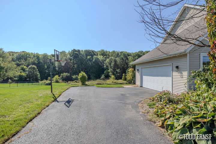 Property Photo:  5814 Cannon Hills Drive NE  MI 49301 
