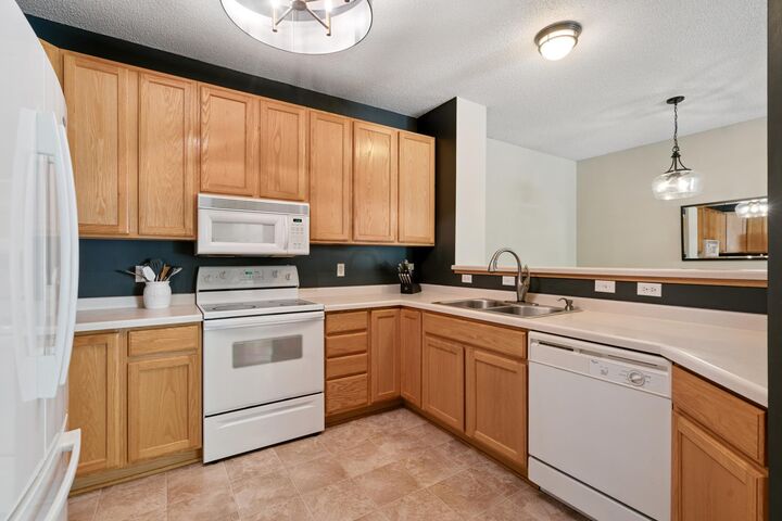 Property Photo:  17195 49th Avenue N B  MN 55446 