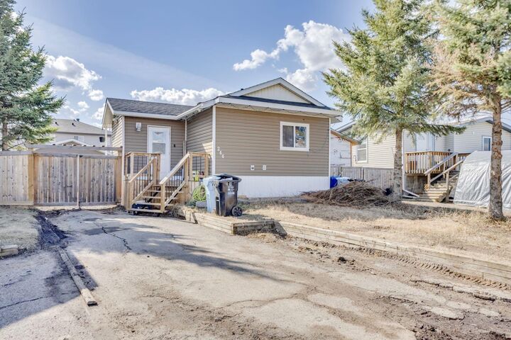 Property Photo:  244 Cokerill Crescent  AB T9K 2J2 