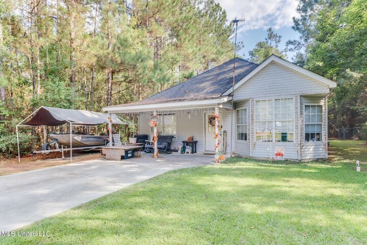 Property Photo:  6141 W Jackson Street  MS 39520 