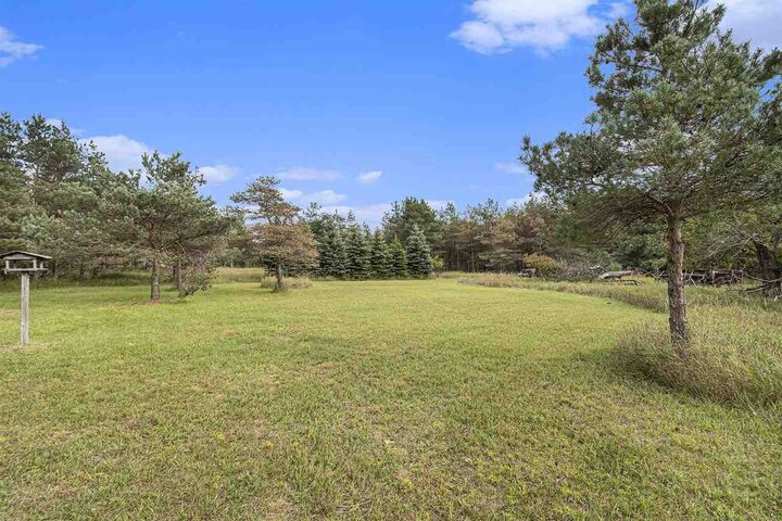 Property Photo:  309 Creekside Dr  MI 49755