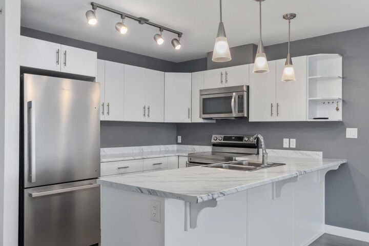 Property Photo:  115 Denholm Gate 409  AB T9H 0E9 