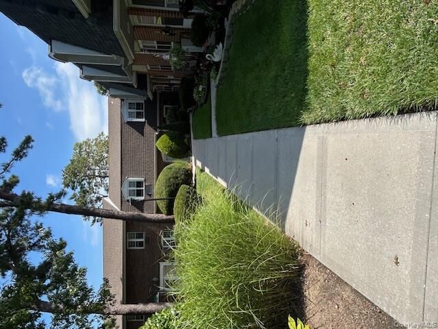 Property Photo: 18 Glen Hollow Dr F9 NY 11742