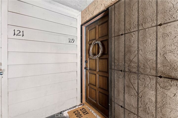 Property Photo:  6600 Warner Avenue 119  CA 92647 