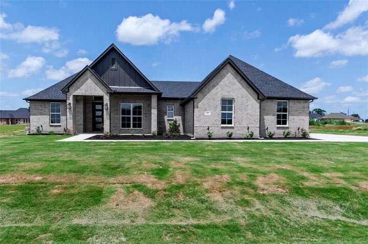 Property Photo:  205 Stuart  TX 76073 