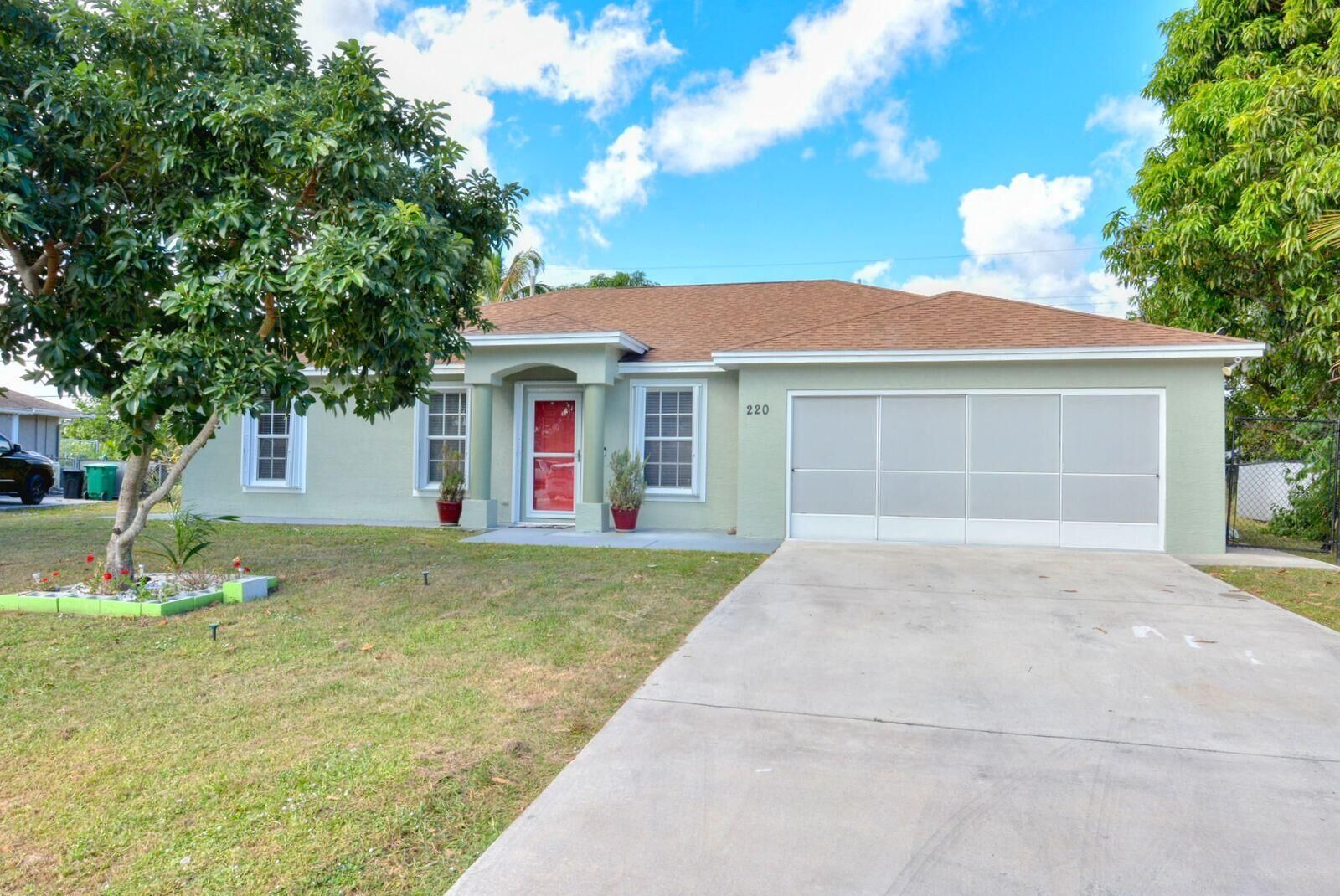 Property Photo: 220 W Arbor Avenue FL 34952