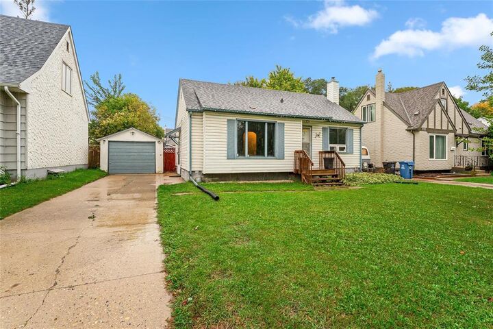 Property Photo: 114 Riverbend Crescent MB R3K 1J1