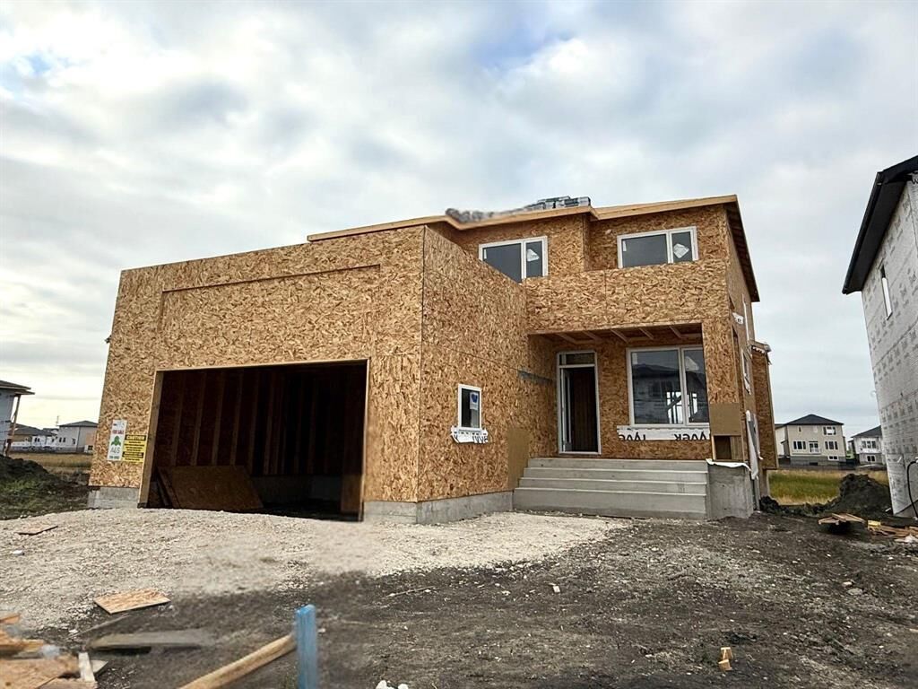 Property Photo: 190 Woodland Way MB R4A 0E7