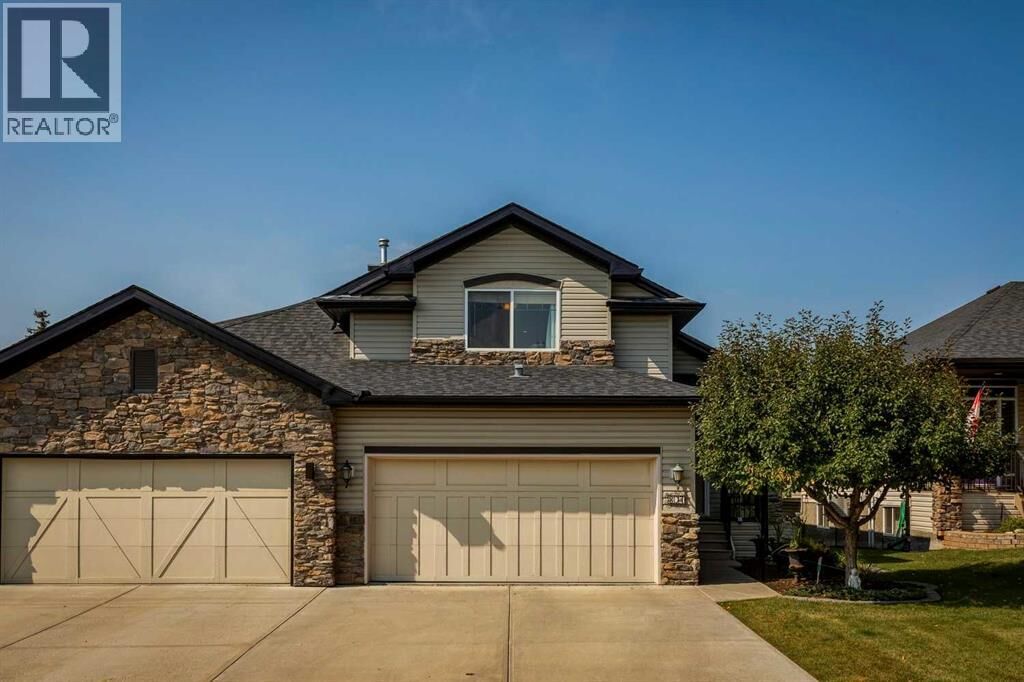 Property Photo: 307 Crystal Green Rise AB T1S 2N5