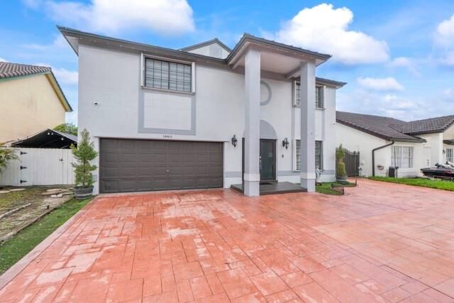 Property Photo: 18811 NW 80th Ave FL 33015