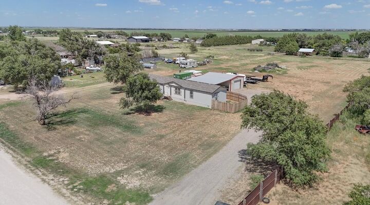 Property Photo: 702 N County Rd 1460 TX 79416