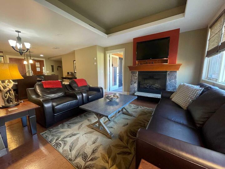Property Photo: 187 Kananaskis Way 313 AB T1W 0A3
