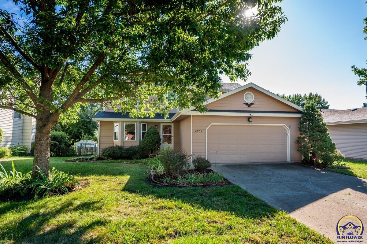 Property Photo:  2830 SW Arvonia Pl  KS 66614 
