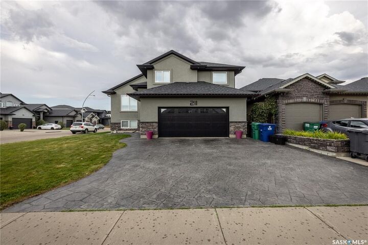 Property Photo: 211 Sauer Crescent SK S7S 1L9