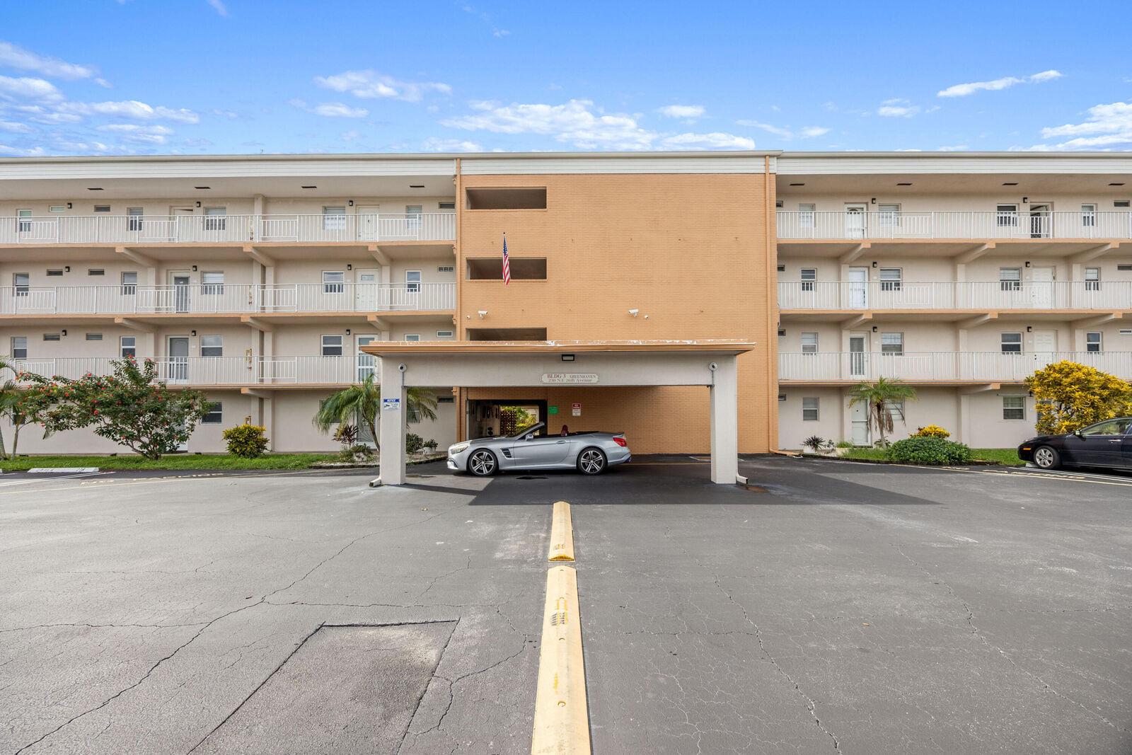 Property Photo:  230 NE 26th Avenue 206  FL 33435 