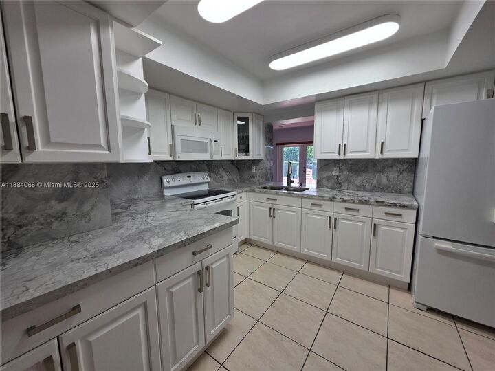 Property Photo: 14760 Lewis Rd 14760 FL 33014