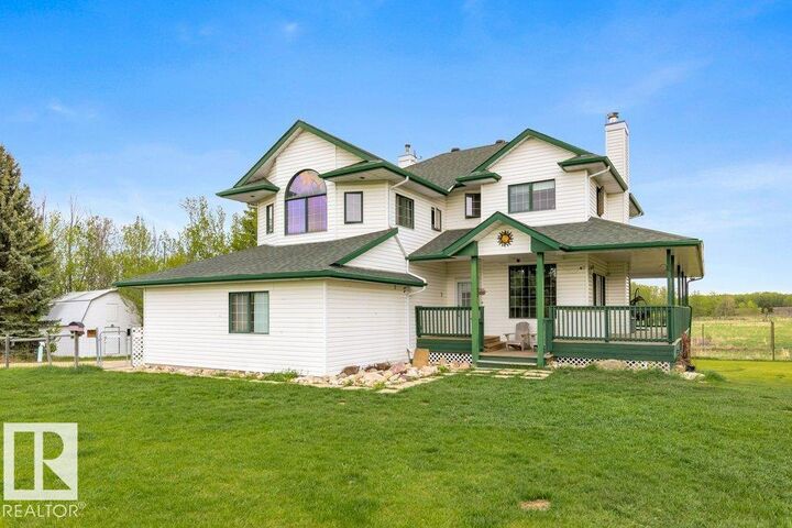Property Photo:  10911A Atim Road  AB T7X 6L9 