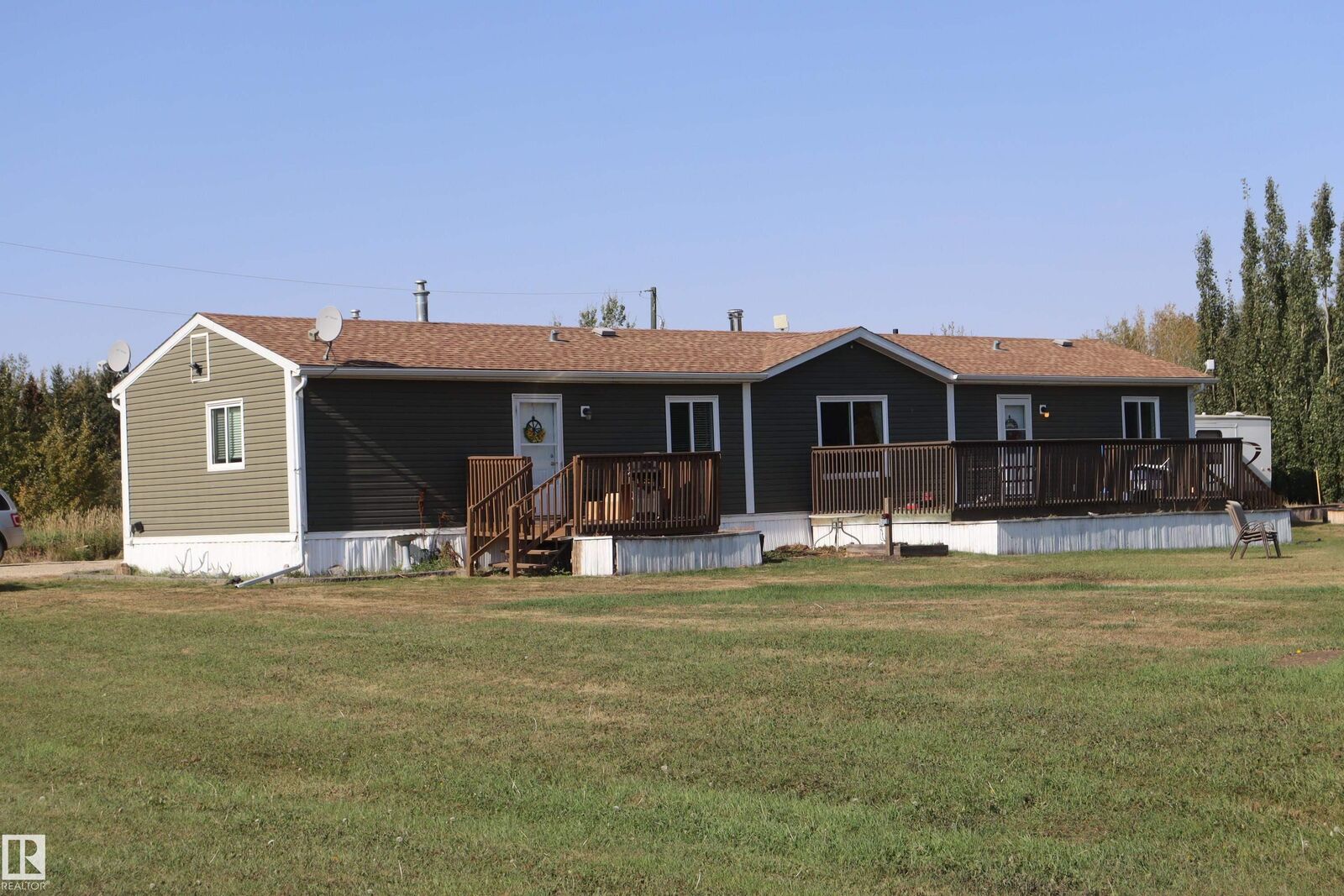 Property Photo:  #2 464032 Rge Rd. 244  AB T9A 1W8 
