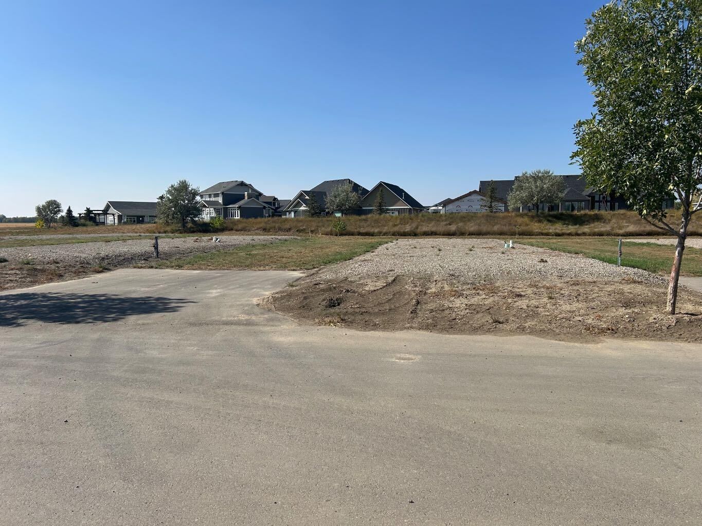 Property Photo: 2043 Sunflower Crescent AB T1M 0G4