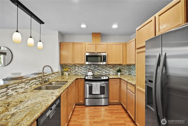 Property Photo:  14714  53rd Avenue W 116  WA 98026 