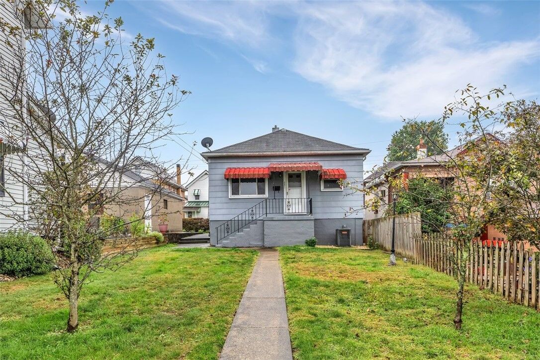Property Photo:  323 Sycamore Street  PA 15690 