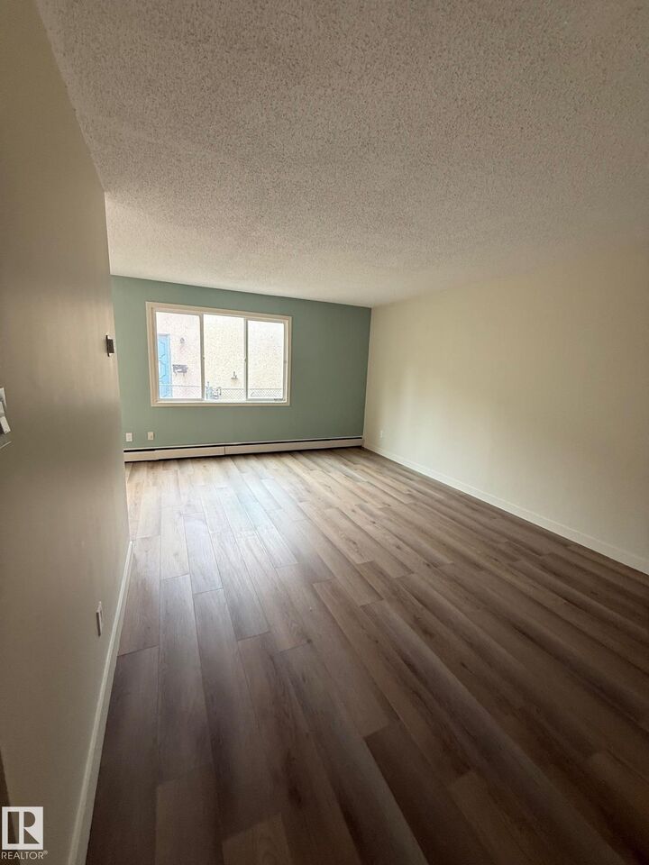 Property Photo:  10035 155 Street NW 1  AB T5P 2L4 