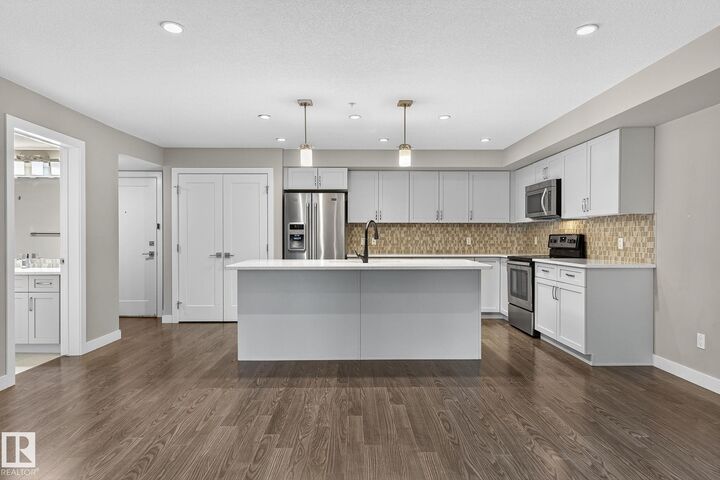 Property Photo:  5029 Edgemont Boulevard NW 102  AB T6M 0S8 