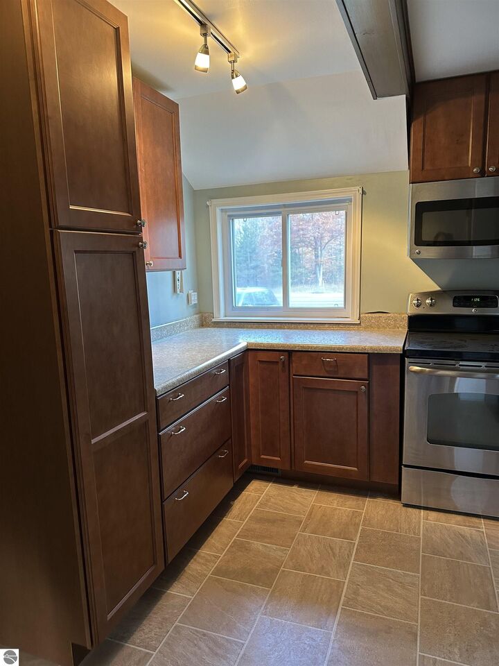 Property Photo:  1940 E M-115  MI 49601 