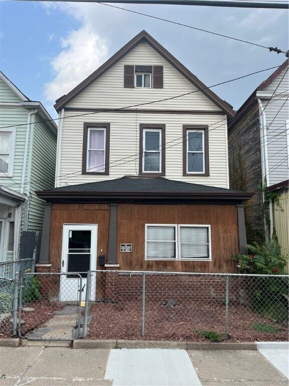 Property Photo:  213 Comrie Ave  PA 15104 