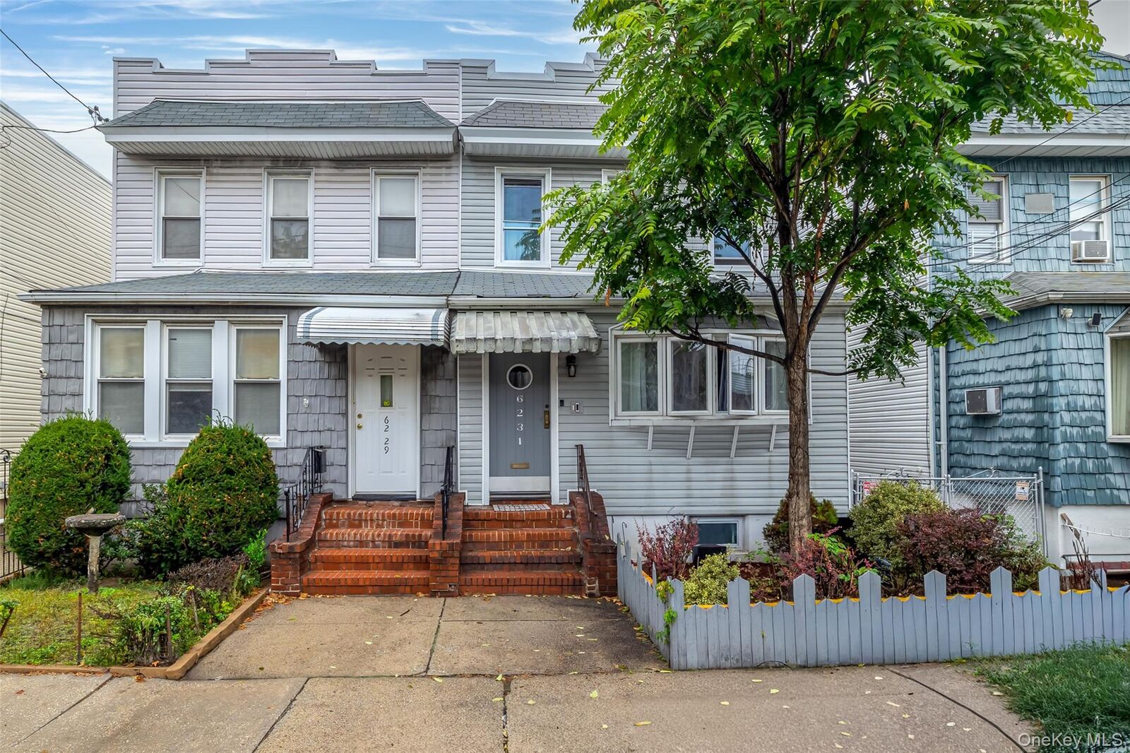 Property Photo:  62-31 60th Road  NY 11378 