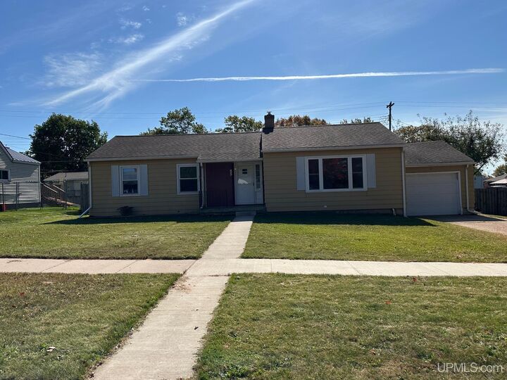 Property Photo:  706 Duncan Avenue  MI 49849-0000 