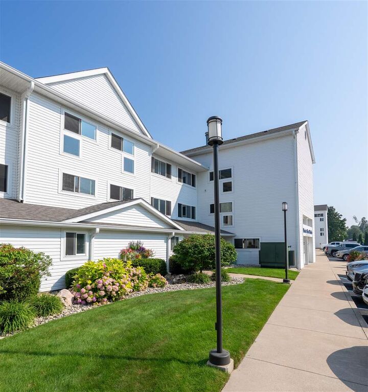 Property Photo:  206 Ferry 44  MI 49720