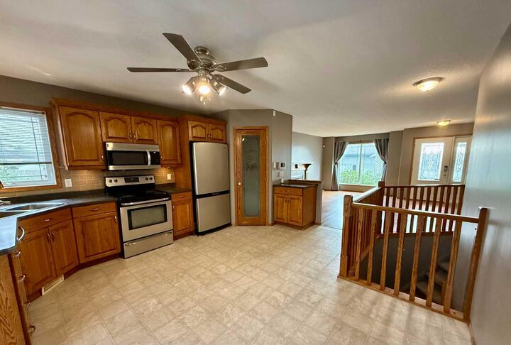 Property Photo:  1121 18A Street Crescent  AB T9W 1L3 