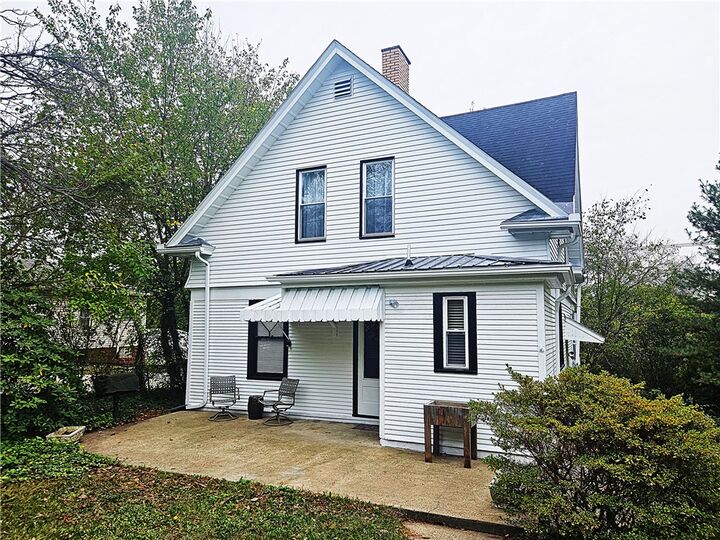 Property Photo:  10361 Washington Ave  PA 15642 