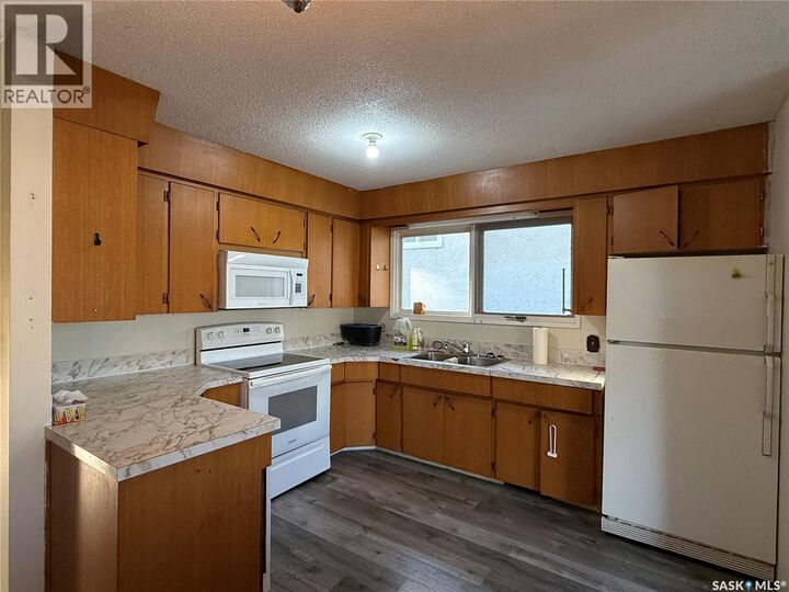 Property Photo: 806 Centre Street SK S9X 1G3