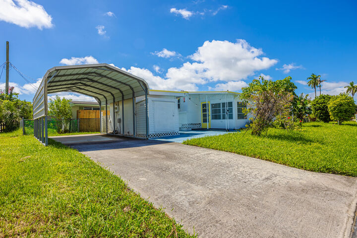 Property Photo: 8904 Palm Street FL 33436