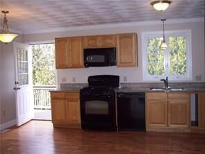 Property Photo:  20 Reservoir Avenue A  RI 02809 