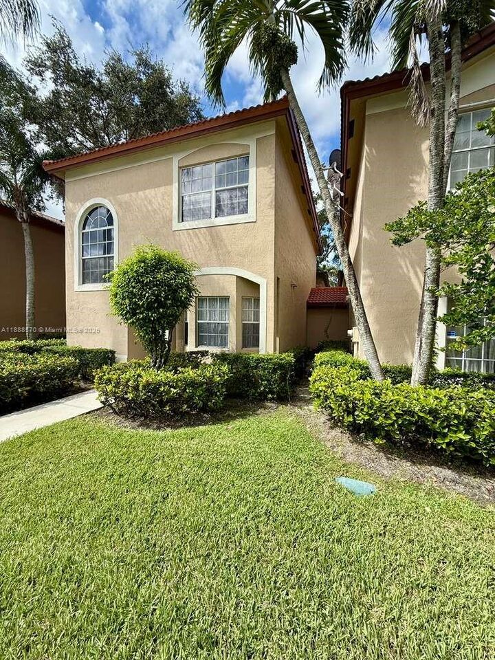Property Photo: 16111 NE Emerald Cove Rd 16111 FL 33331