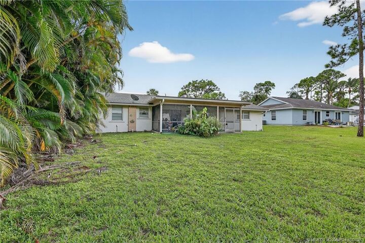 Property Photo:  6299 SE Poinciana Lane  FL 33455 