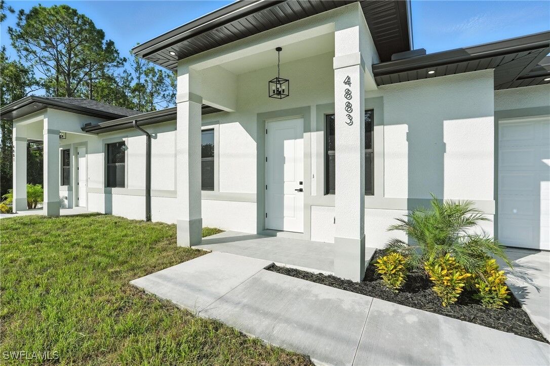 Property Photo: 4881/4883 Leonard Boulevard S FL 33973