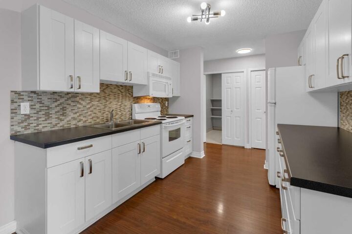 Property Photo:  3606 Erlton Court SW 204  AB T2S 3A5 