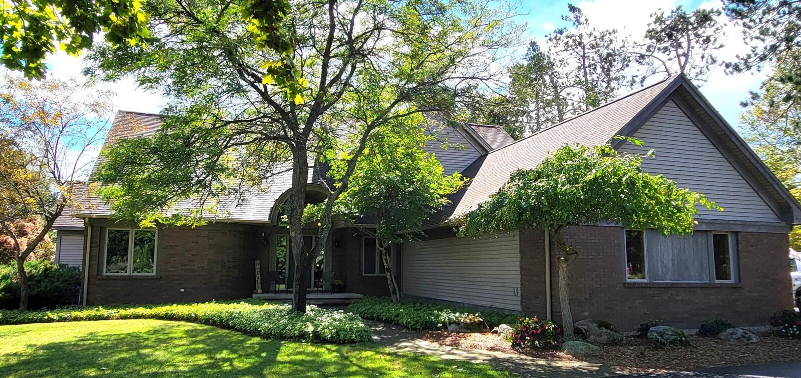 Property Photo:  212 Long Rapids Road  MI 49707