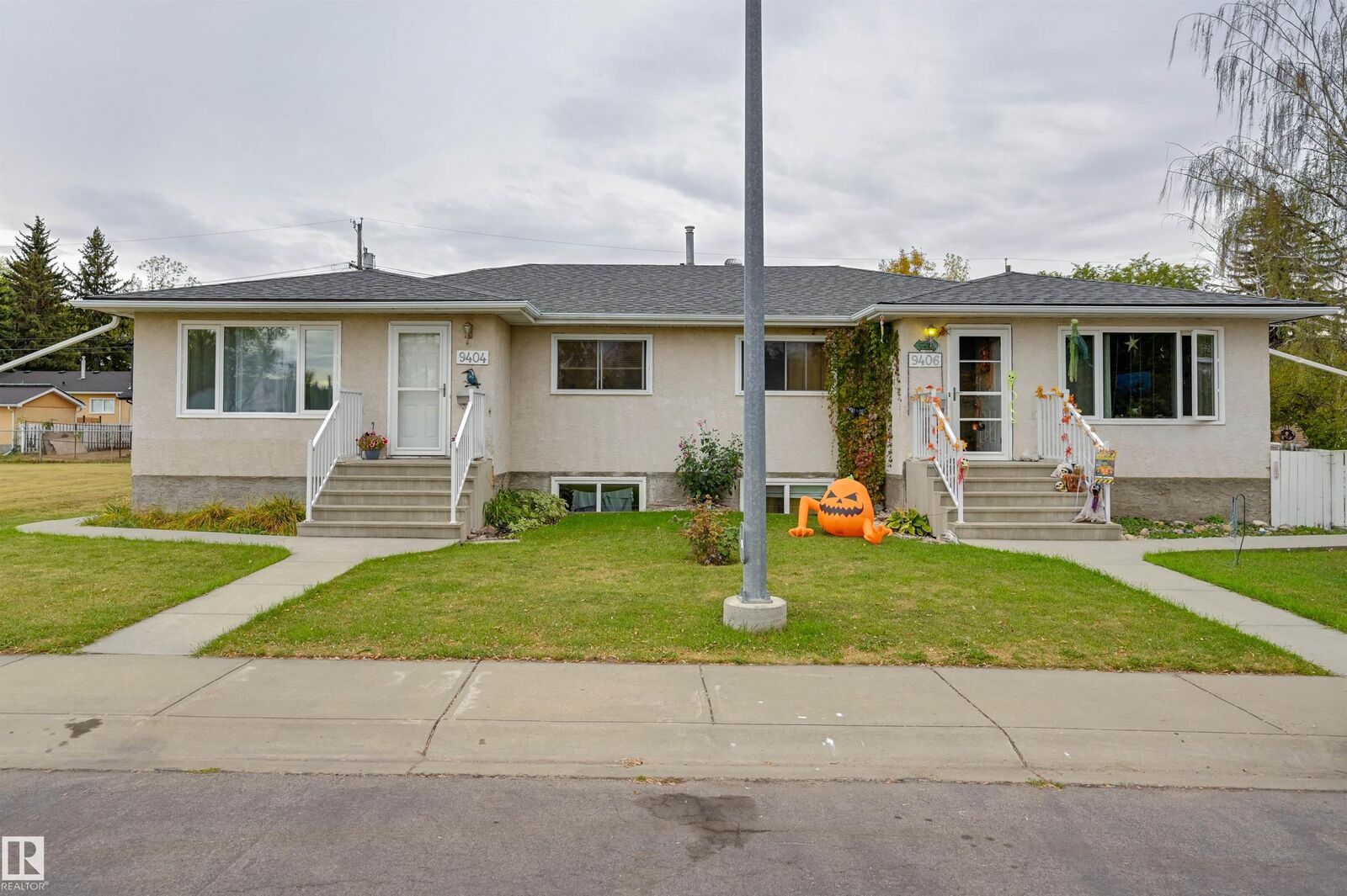 Property Photo: 9404 9406 Holyrood Road NW AB T6C 4H4