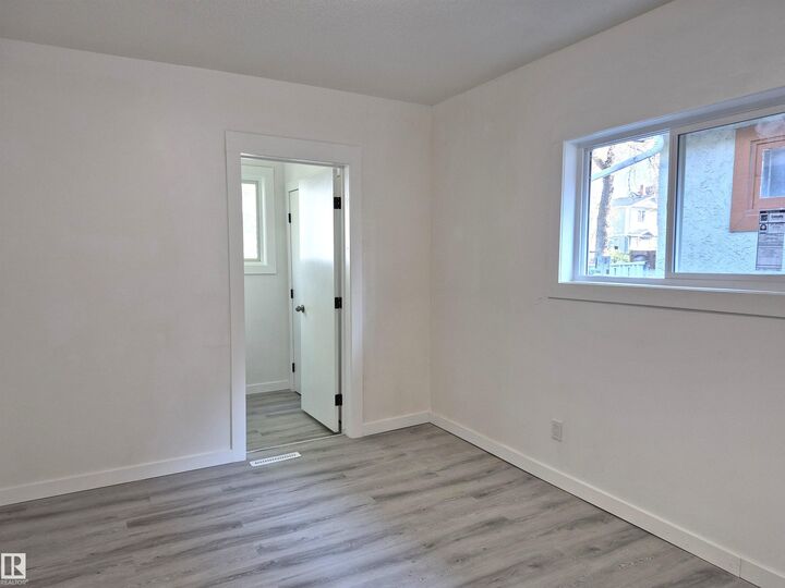 Property Photo: 11240 94 Street NW AB T5G 1G9