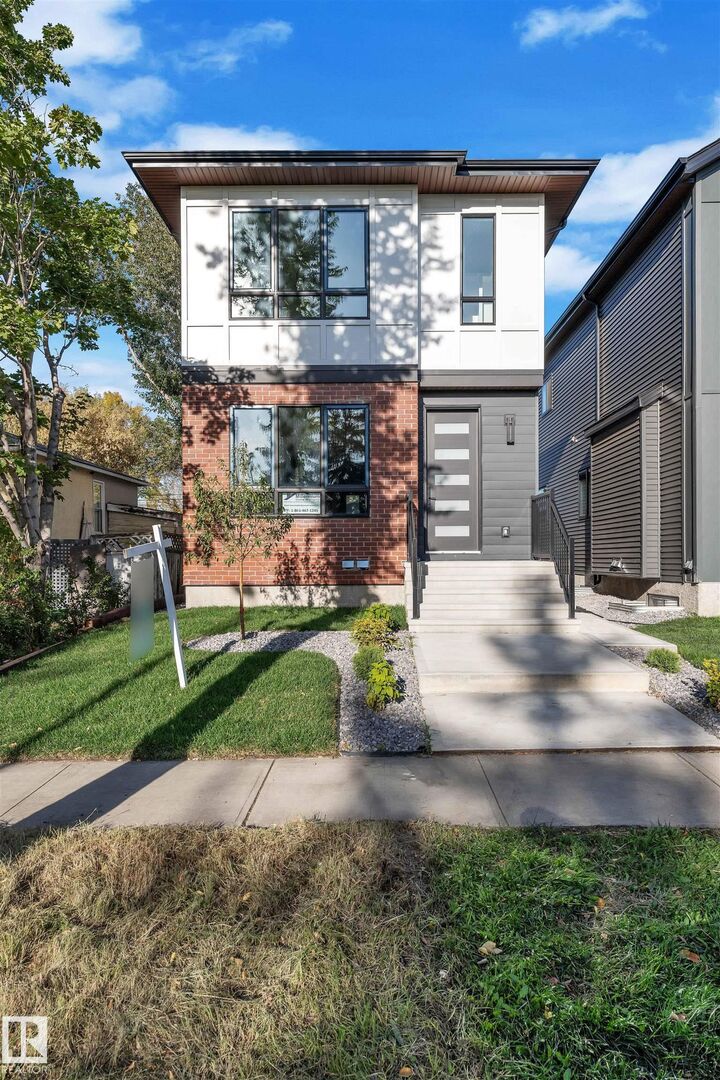 Property Photo: 10725 132 Street NW AB T5M 1C8