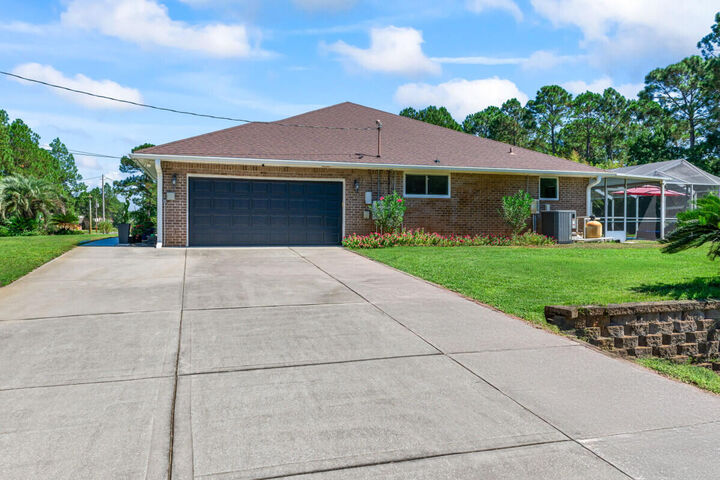 Property Photo: 6985 Flintwood Street FL 32566